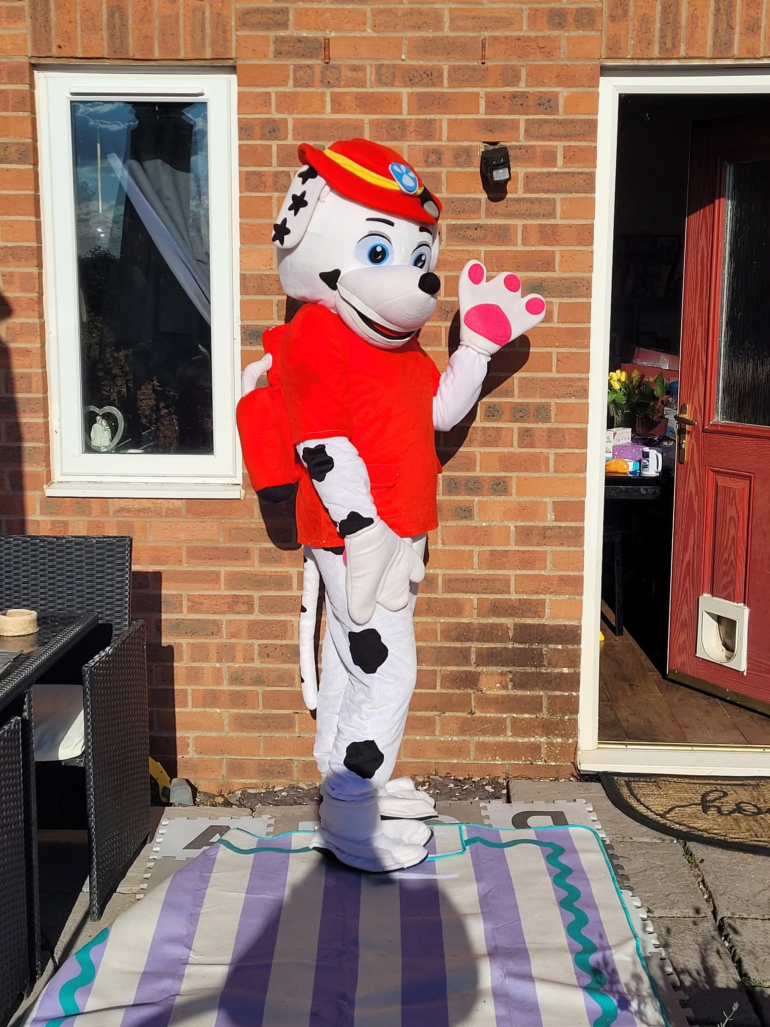 Paw Patrol character mascot waving